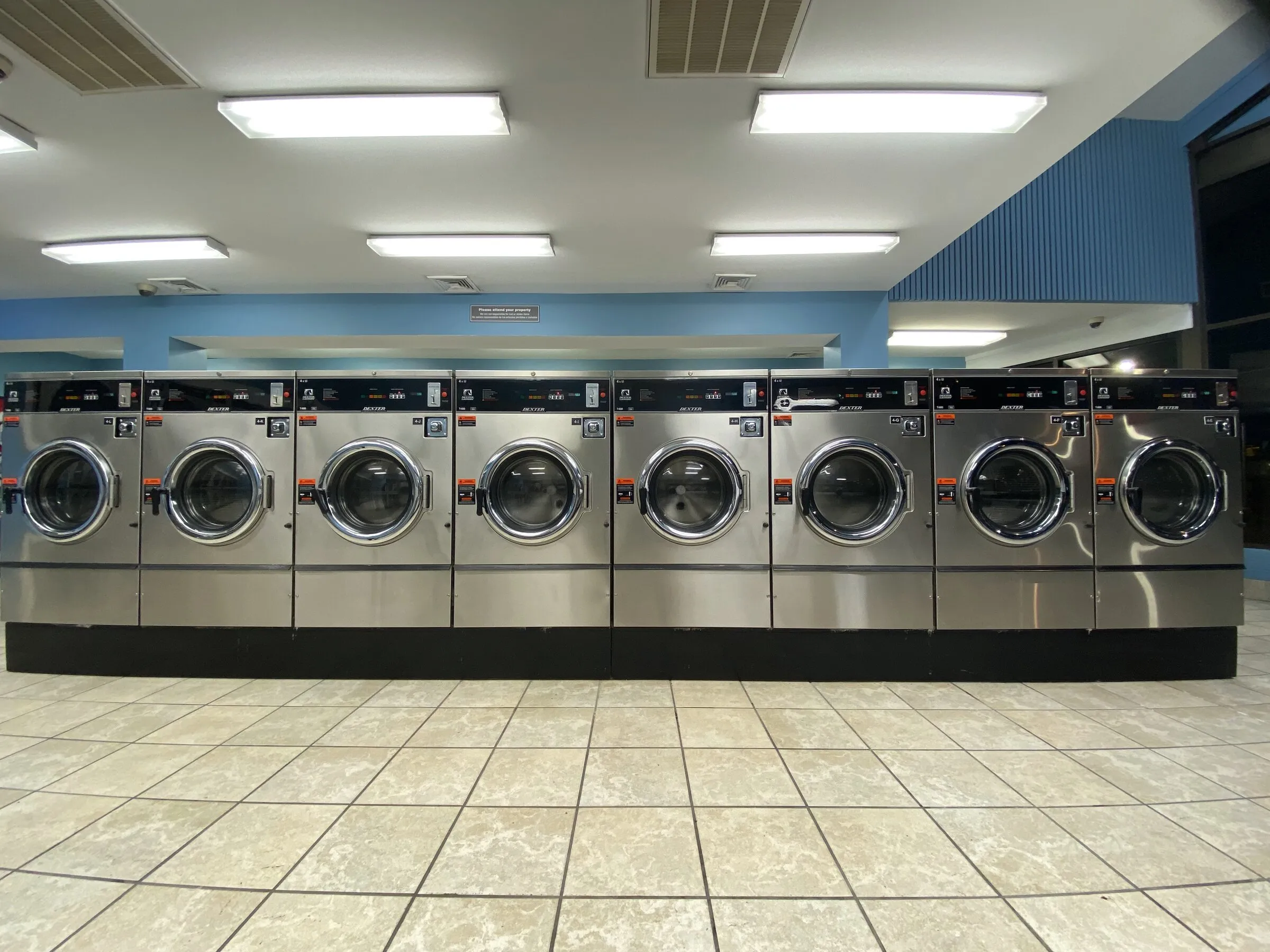 A wall of front-load washers.